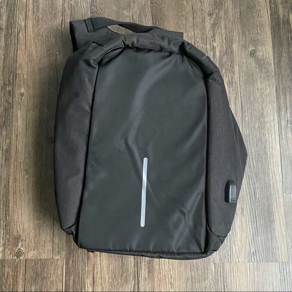NWOT laptop / camera bag backpack.